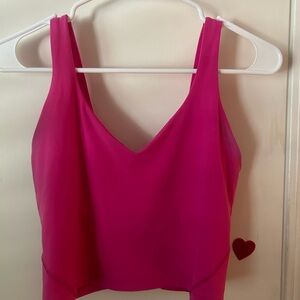 Lululemon hot pink crop top.
